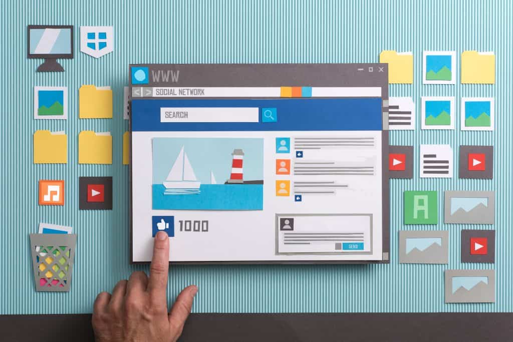 Vector illustration of a social media webpage on a computer screen surrounded by digital icons and folders representing web design and development services in Oshawa, Durham Region, Bowmanville.