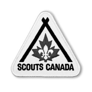 Scouts Canada embroidered patch featuring a leaf and fleur-de-lis symbols, representing Canadian scouting. Perfect for uniforms or collectible memorabilia.