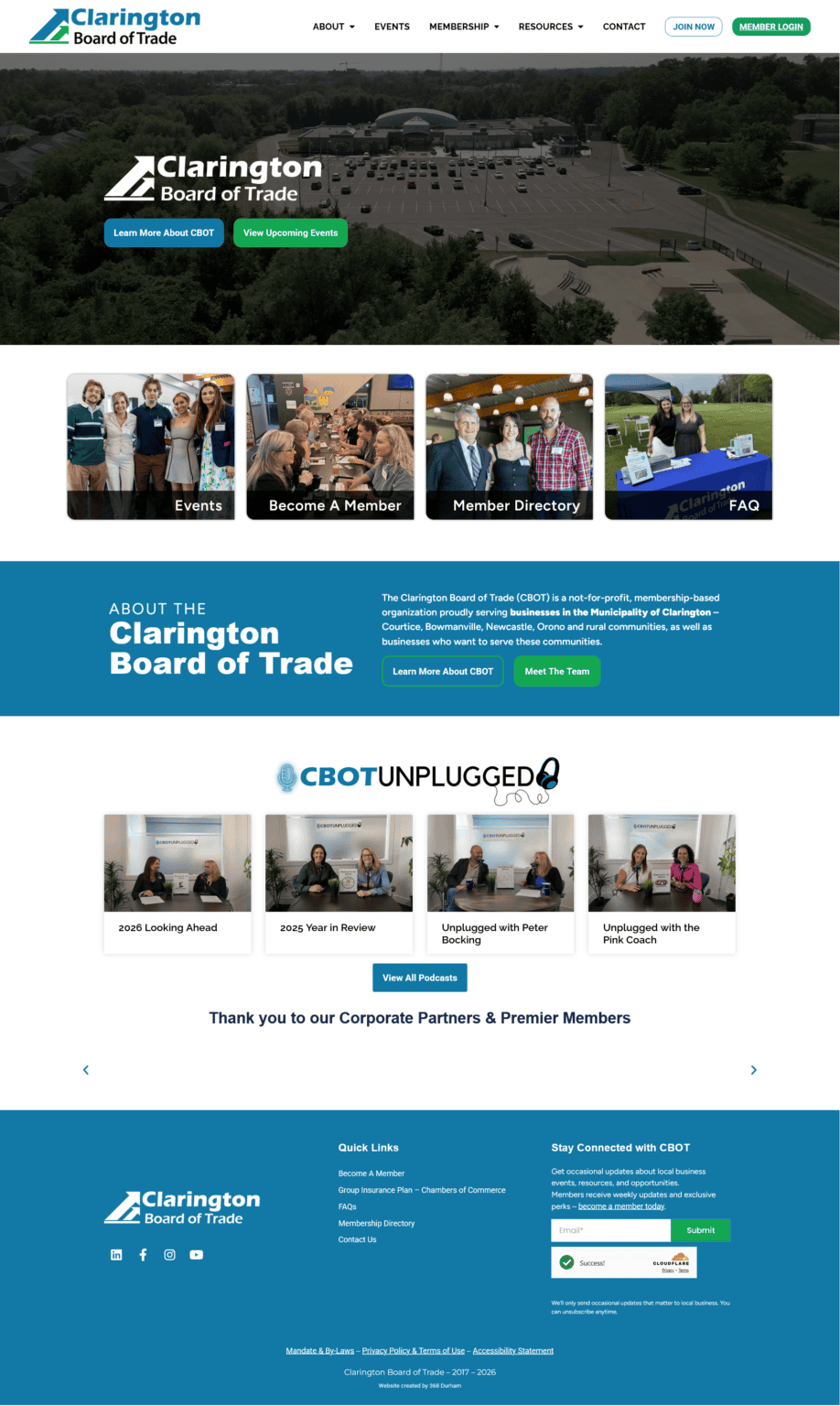 Aerial view of Clarington Board of Trade event space and parking lot near wooded area.